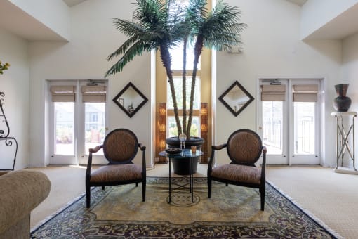 A spacious and inviting clubhouse living area with warm lighting.